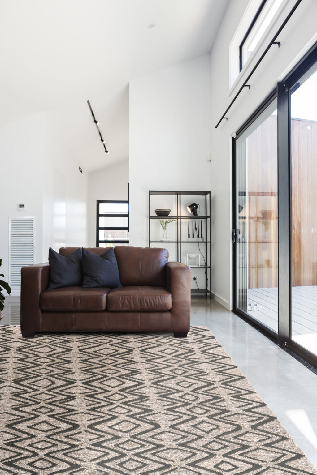 2' X 3' Black Gray And Taupe Wool Geometric Tufted Handmade Stain Resistant Area Rug