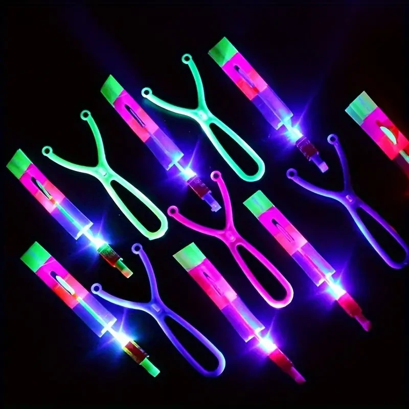 12-Pack LED Light-Up Slingshot Flying Helicopter Toys for Kids – Party Favor Glow in The Dark Fun for Ages 3-6, Durable Plastic, Assorted Colors, Ideal for Birthday, Halloween, and Christmas Gifts