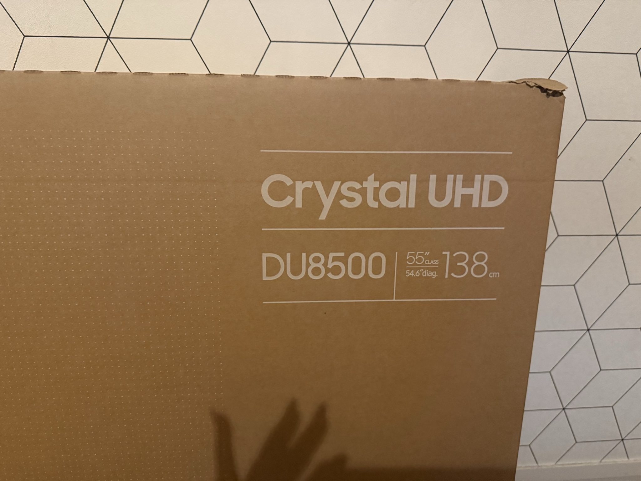 Boxed 55 “ samsung crystal UHD DU8500 and Soundbar C450