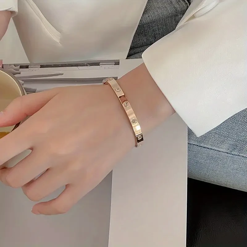 Titanium Steel Rhinestone Bangle – Niche Oval Hand Jewelry for Ladies